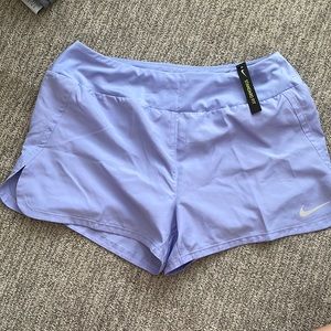 Purple Nike shorts